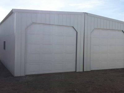 24×24 With (2) 9×7 Overhead Doors Included